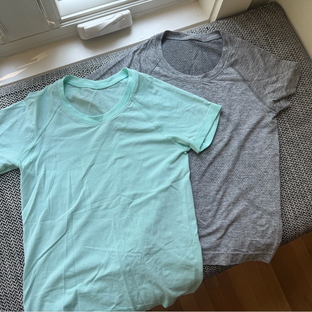 Two Lululemon fitted short sleeve t-shirts